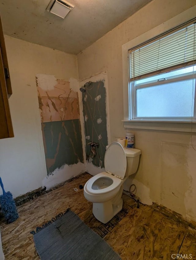 548 S Plumas St, Willows, CA 95988 - bathroom with visible vents, walk in shower, and toilet