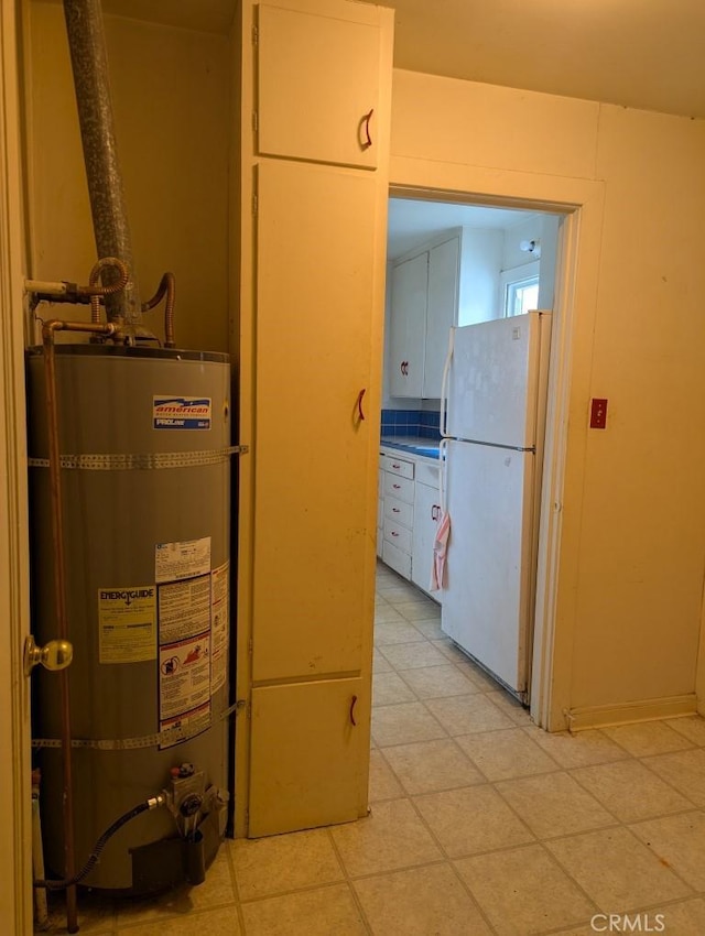 548 S Plumas St, Willows, CA 95988 - utility room with gas water heater