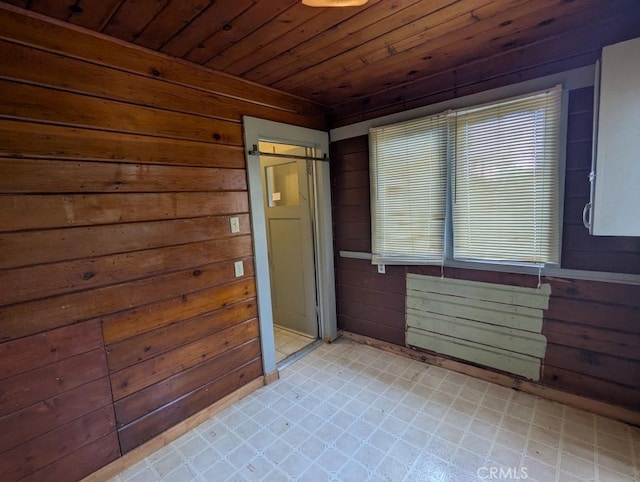 548 S Plumas St, Willows, CA 95988 - spare room with wood ceiling, light floors, wood walls, and a wealth of natural light