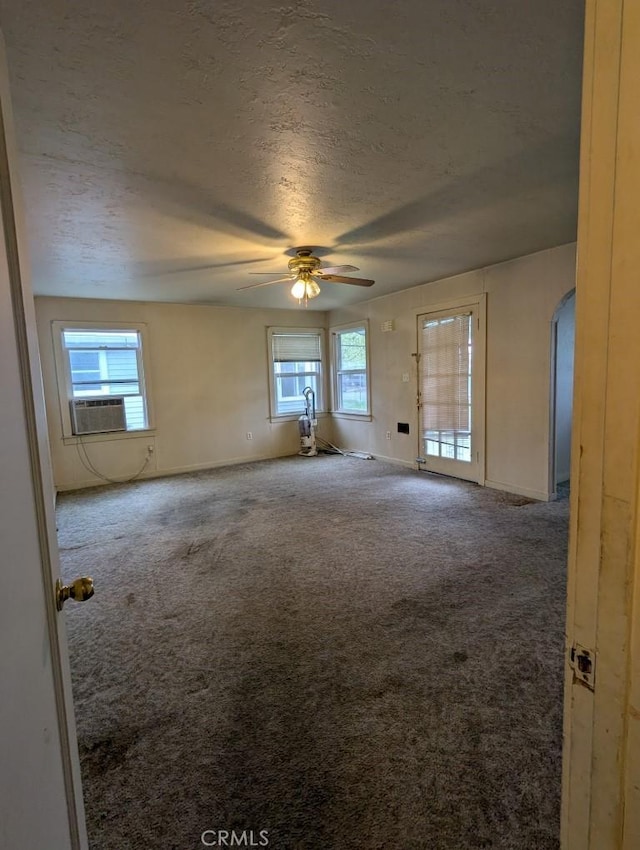 548 S Plumas St, Willows, CA 95988 - unfurnished room with a textured ceiling, ceiling fan, carpet, and plenty of natural light