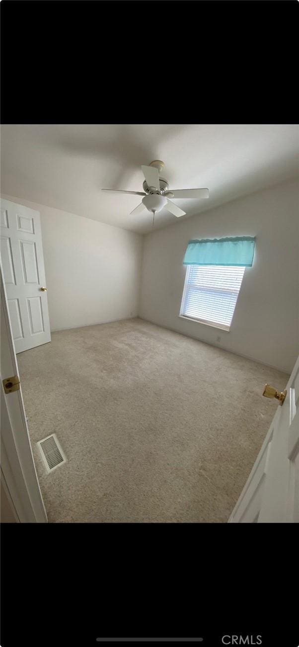 6117 Juniper Rd, Lake Isabella, CA 93240 - unfurnished bedroom with carpet and a ceiling fan