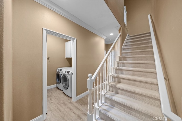 staircase featuring baseboards, washer and dryer, crown molding, recessed lighting, and wood finished floors