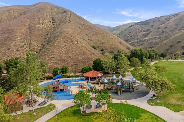 view of pool with a gazebo and a mountain view