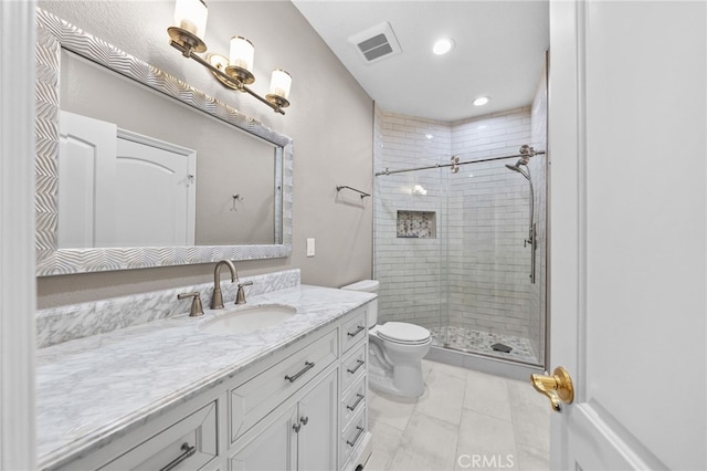 full bathroom featuring vanity, a stall shower, recessed lighting, toilet, and visible vents