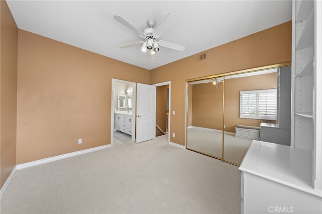 24240 Avenida De Marcia, Yorba Linda, CA 92887 - unfurnished bedroom featuring light carpet, a closet, a ceiling fan, and connected bathroom