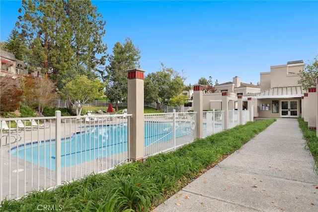 pool featuring fence