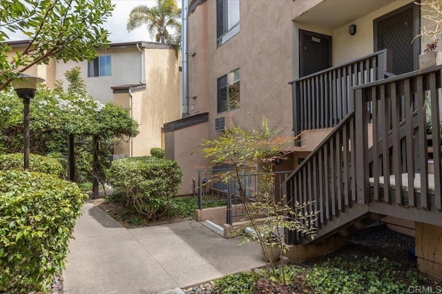 view of property with stairway