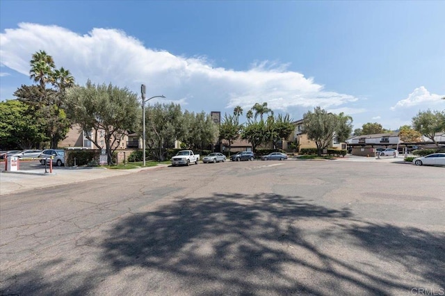 7960 Mission Center Ct Unit F, San Diego, CA 92108 - view of asphalt road with street lighting, a residential view, and sidewalks