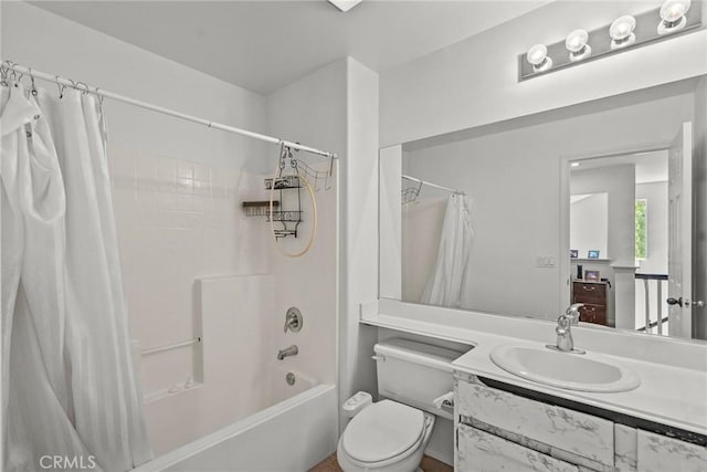 full bath featuring toilet, shower / tub combo with curtain, and vanity