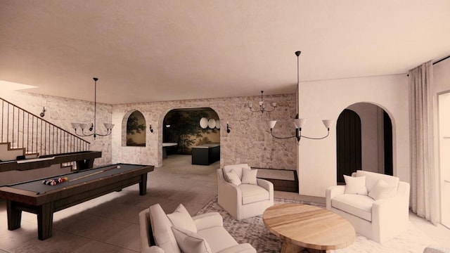 rec room featuring arched walkways and pool table