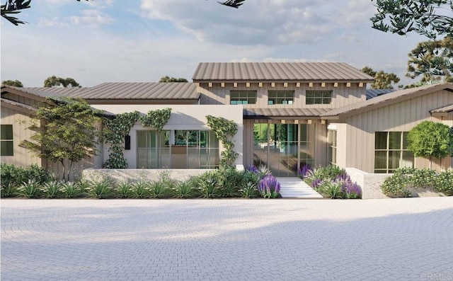 exterior space with a tile roof