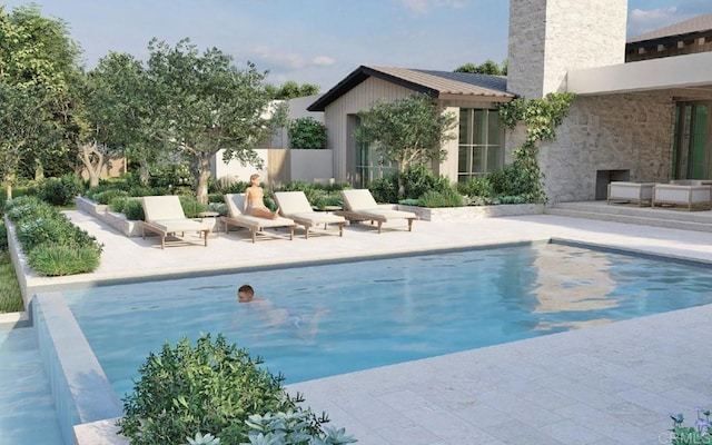pool featuring a patio area