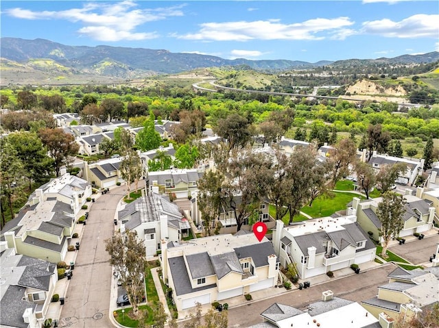 bird's eye view featuring a residential view and a mountain view