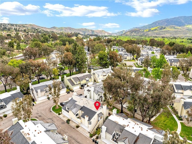 bird's eye view with a residential view and a mountain view