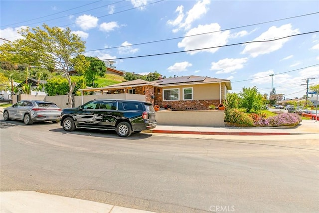 10444 Flowerdale Ct, Sun Valley, CA 91352 - single story home featuring stucco siding and roof mounted solar panels
