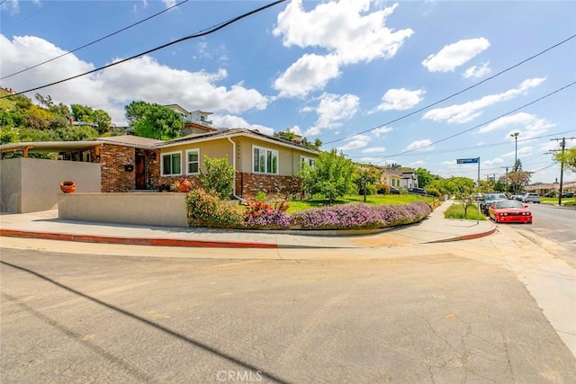 10444 Flowerdale Ct, Sun Valley, CA 91352 - view of front of house with brick siding and stucco siding