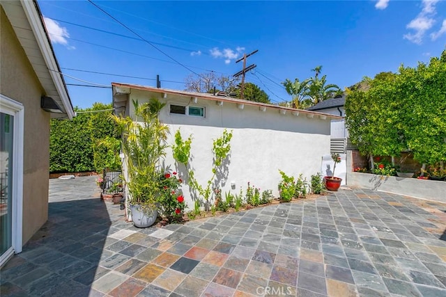 10444 Flowerdale Ct, Sun Valley, CA 91352 - view of property exterior featuring a patio area and stucco siding