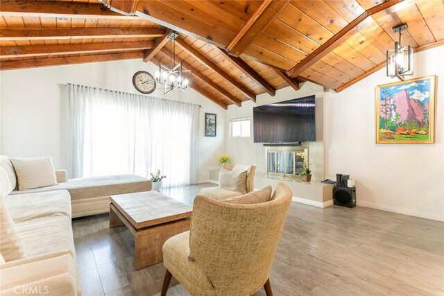 10444 Flowerdale Ct, Sun Valley, CA 91352 - living room featuring a chandelier, wooden ceiling, wood finished floors, and vaulted ceiling with beams