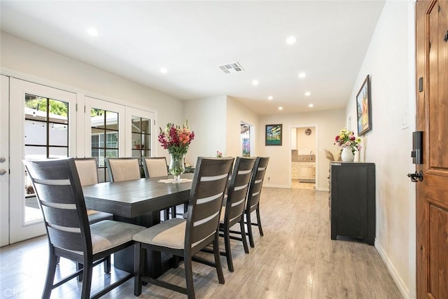 10444 Flowerdale Ct, Sun Valley, CA 91352 - dining room with light wood-style floors, baseboards, visible vents, and recessed lighting