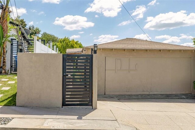 10444 Flowerdale Ct, Sun Valley, CA 91352 - view of gate featuring fence
