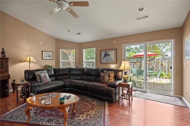 11 Maddie Ct, Chico, CA 95973 - living area with wood finished floors, ceiling fan, lofted ceiling, and visible vents