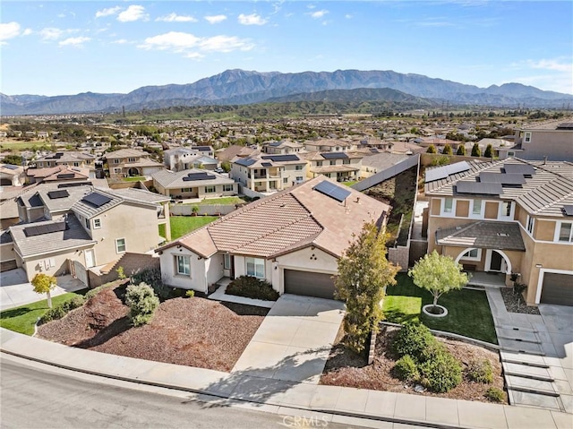 bird's eye view featuring a mountain view and a residential view