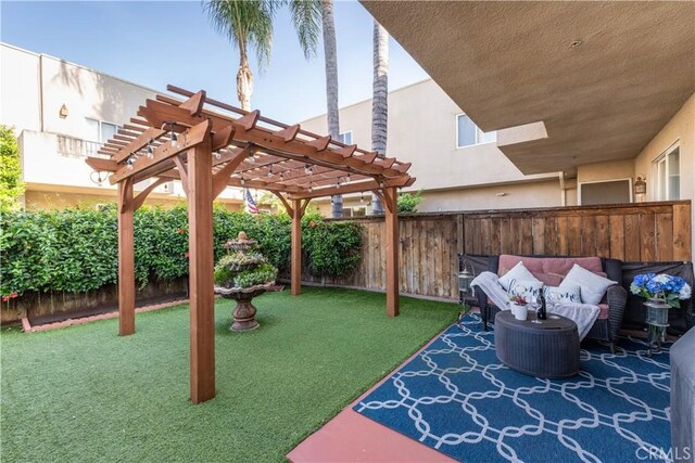view of patio featuring a fenced backyard, a pergola, and an outdoor hangout area