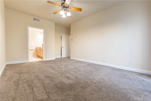 interior space with visible vents, ceiling fan, carpet flooring, and baseboards