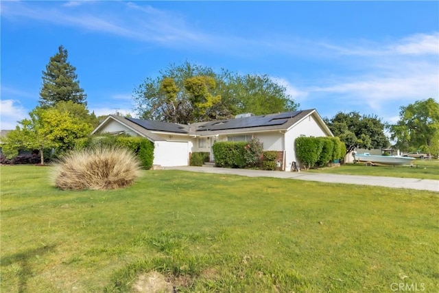 2855 Pira Dr, Merced, CA 95348 - ranch-style home with a front yard and solar panels
