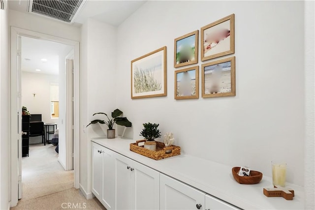 59 Sanctuary Ln, Mission Viejo, CA 92692 - corridor with light carpet, recessed lighting, and visible vents