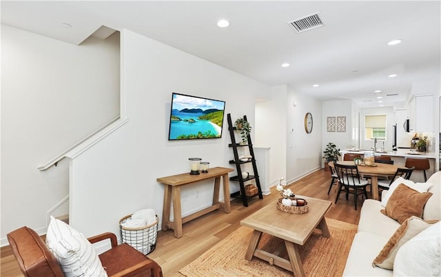 59 Sanctuary Ln, Mission Viejo, CA 92692 - living area with visible vents, light wood-style flooring, recessed lighting, and stairs