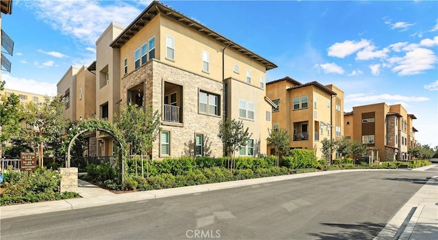 59 Sanctuary Ln, Mission Viejo, CA 92692 - view of building exterior with a residential view