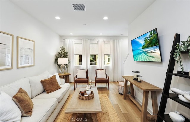 59 Sanctuary Ln, Mission Viejo, CA 92692 - living area with visible vents, recessed lighting, and light wood-style floors