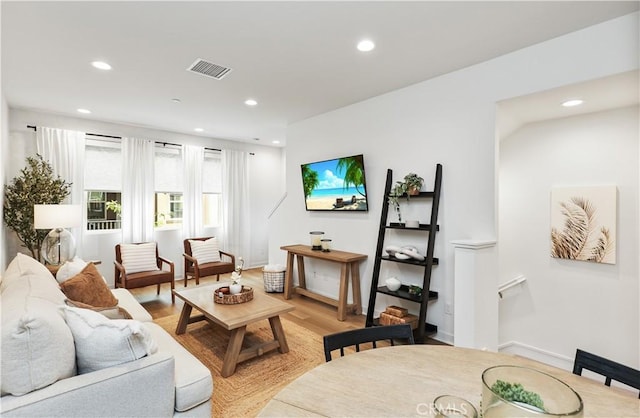 59 Sanctuary Ln, Mission Viejo, CA 92692 - living room featuring recessed lighting, visible vents, and light wood-style flooring