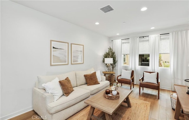 59 Sanctuary Ln, Mission Viejo, CA 92692 - living room with light wood-type flooring, baseboards, visible vents, and recessed lighting