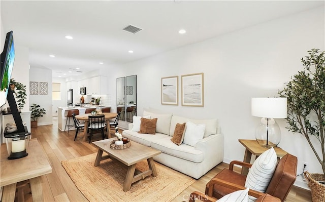 59 Sanctuary Ln, Mission Viejo, CA 92692 - living room featuring light wood-style flooring, visible vents, and recessed lighting