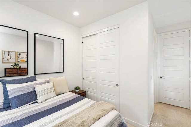 59 Sanctuary Ln, Mission Viejo, CA 92692 - bedroom featuring a closet, baseboards, recessed lighting, and light carpet