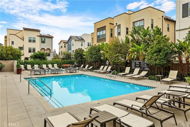 59 Sanctuary Ln, Mission Viejo, CA 92692 - community pool with a patio area, fence, and a residential view