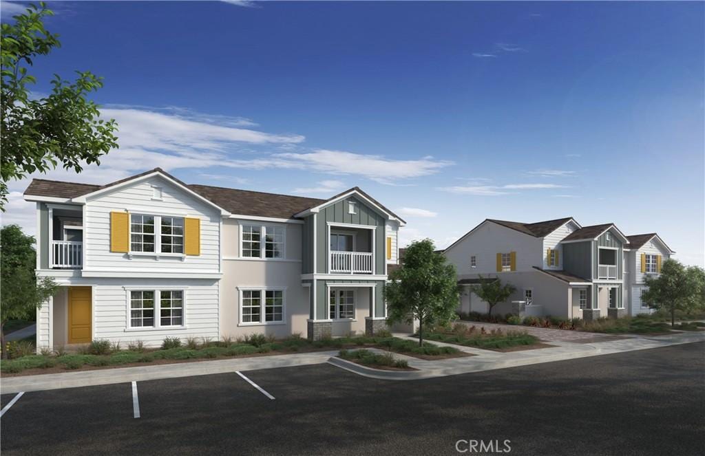 4288 S Hermosa Paseo, Ontario, CA 91761 - townhome / multi-family property featuring board and batten siding and uncovered parking