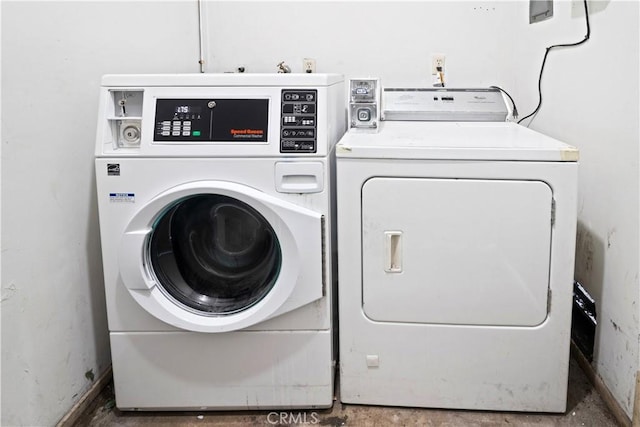 laundry room featuring separate washer and dryer