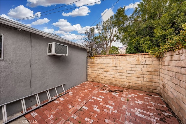 1492 Coolidge Ave, Pasadena, CA 91104 - view of patio with an AC wall unit and fence private yard