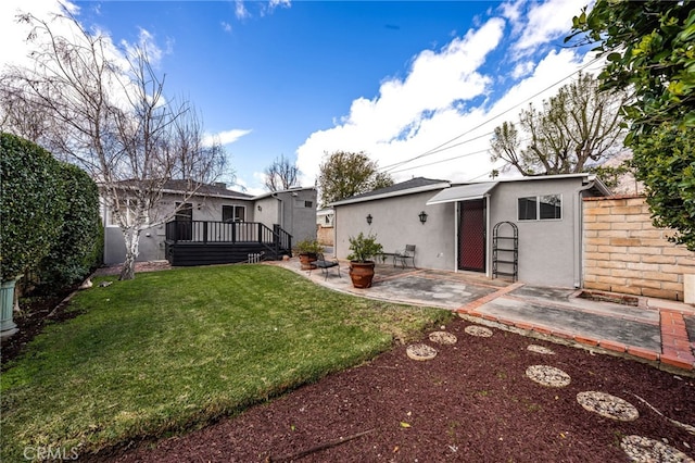 1492 Coolidge Ave, Pasadena, CA 91104 - back of house with a patio area, stucco siding, fence, and a lawn