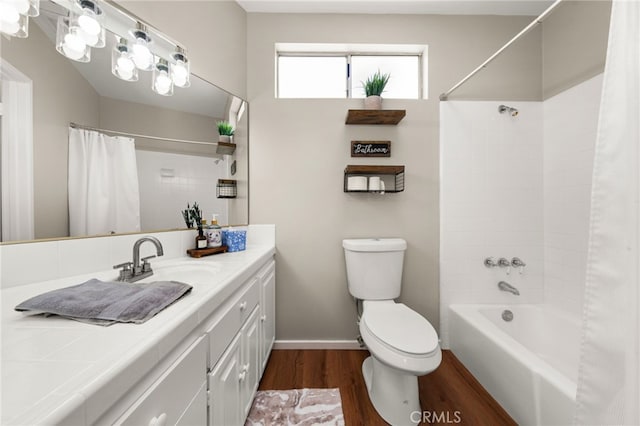 1492 Coolidge Ave, Pasadena, CA 91104 - bathroom featuring shower / bath combo, baseboards, toilet, vanity, and wood finished floors