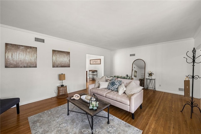 1492 Coolidge Ave, Pasadena, CA 91104 - living area with ornamental molding, visible vents, baseboards, and wood finished floors