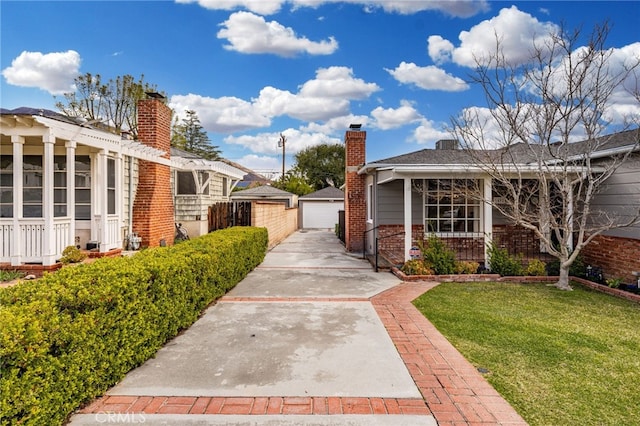 1492 Coolidge Ave, Pasadena, CA 91104 - exterior space featuring a yard, an outdoor structure, and a garage