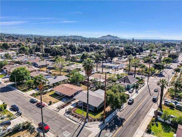 birds eye view of property featuring a mountain view and a residential view