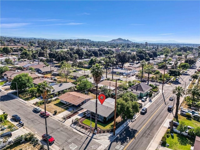 birds eye view of property featuring a residential view and a mountain view