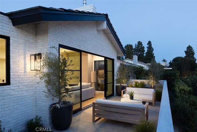 3 Rue Valbonne, Newport Beach, CA 92660 - rear view of house with outdoor lounge area and a patio