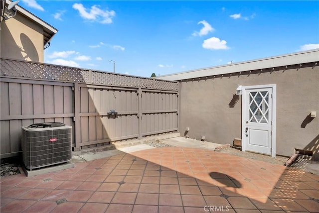 7200 Newton Way, Stanton, CA 90680 - view of patio / terrace featuring central air condition unit and fence