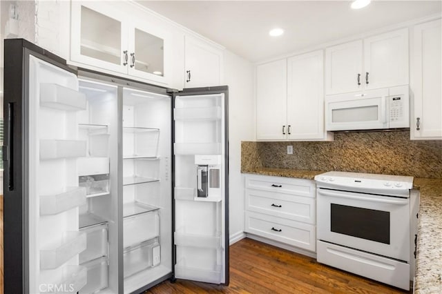 7200 Newton Way, Stanton, CA 90680 - kitchen with light stone countertops, white appliances, dark wood-type flooring, backsplash, and white cabinets